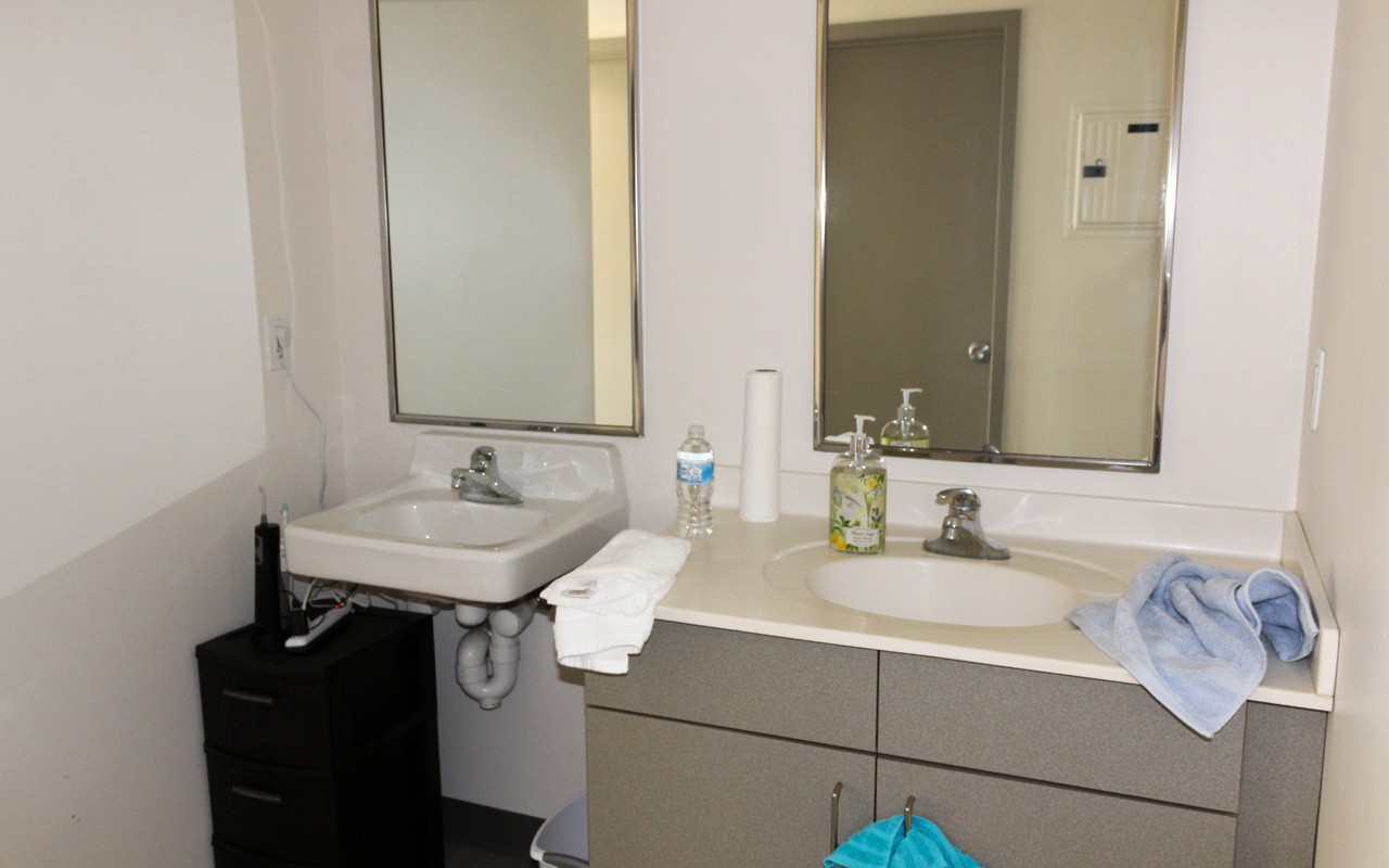 Sinks in a bathroom in a Schneider Hall bathroom.