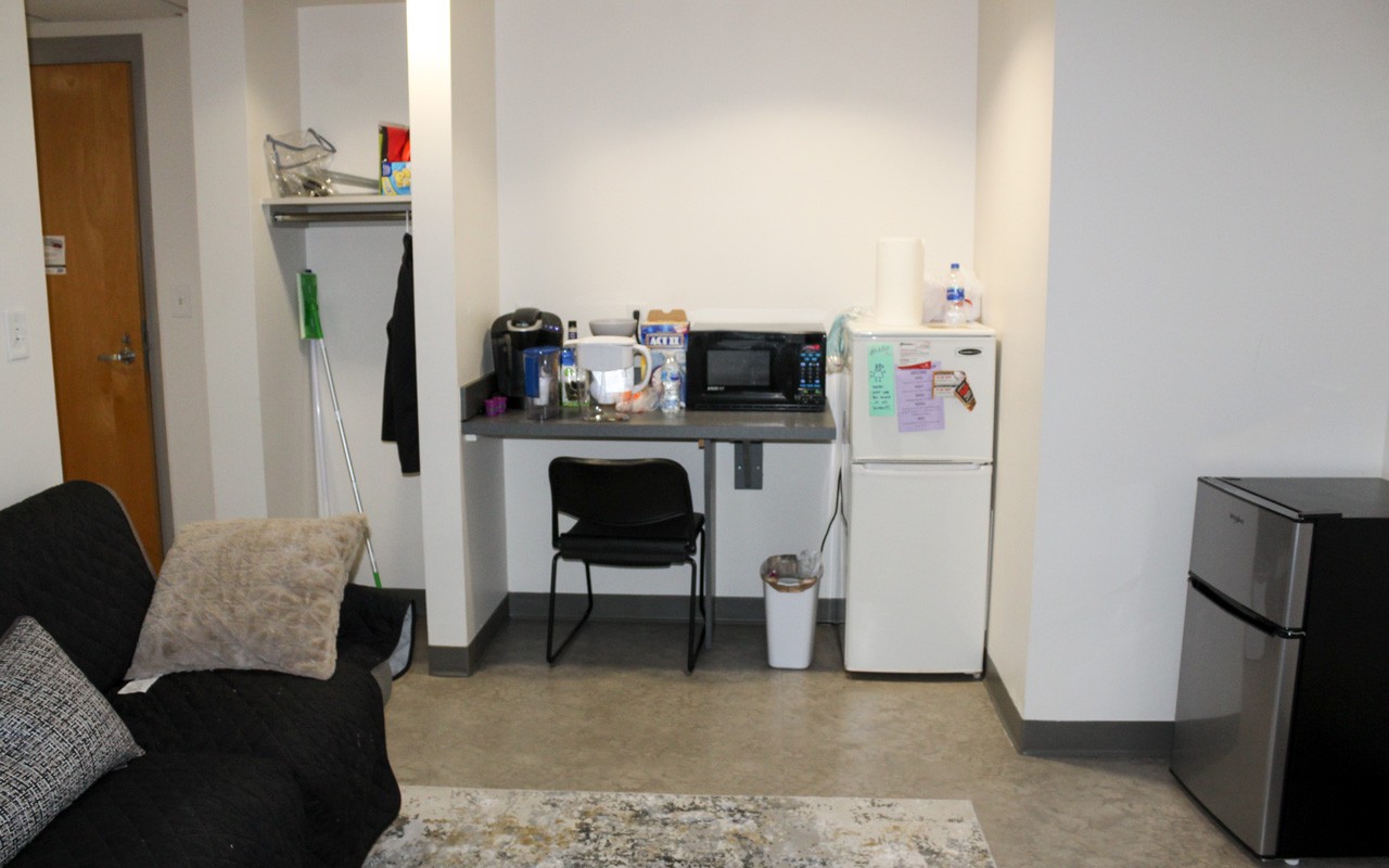 Common area in a quad room in Schneider Hall.